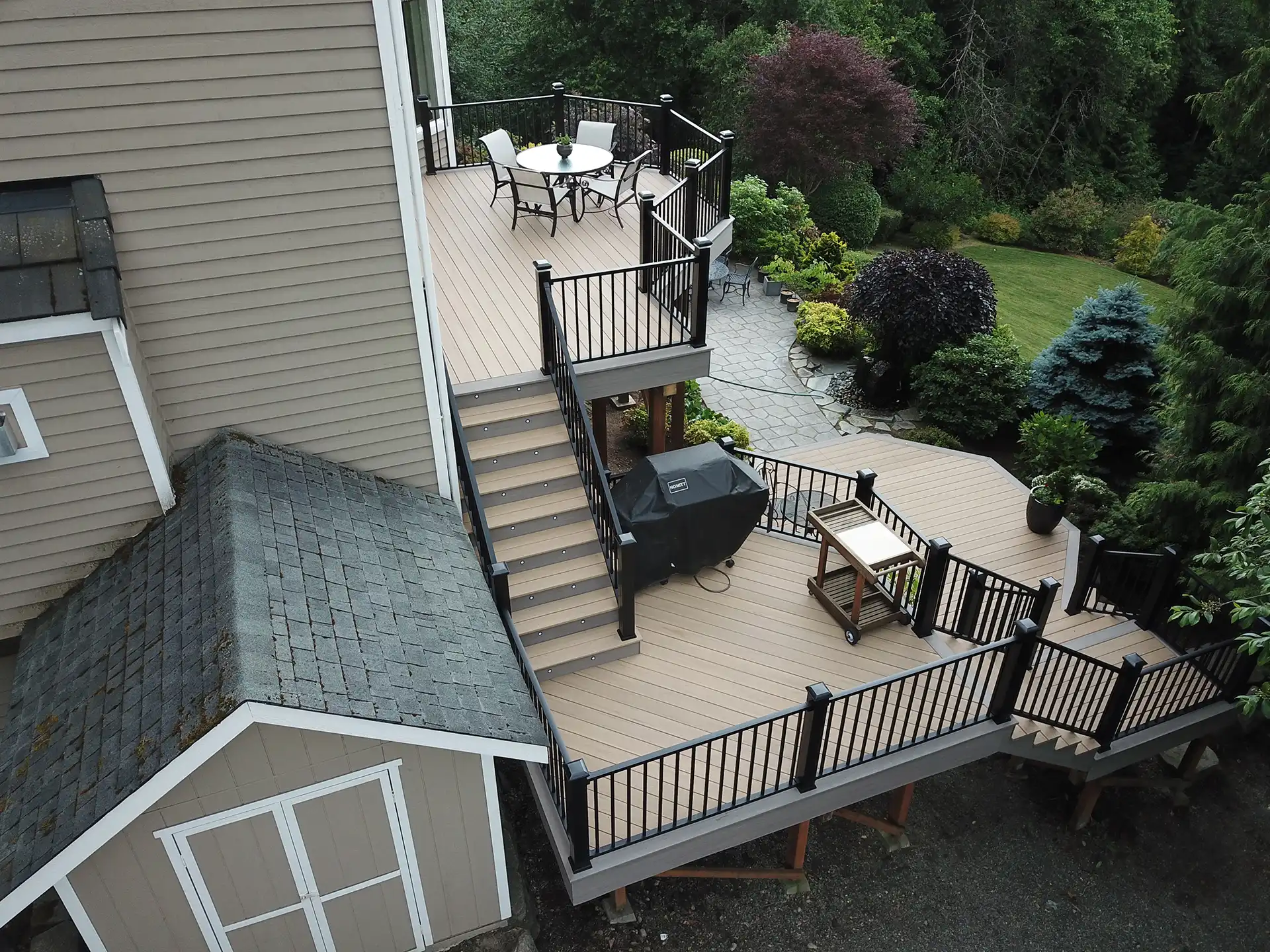 photo of a multi-level custom deck - Custom deck builders in Greater Seattle Area