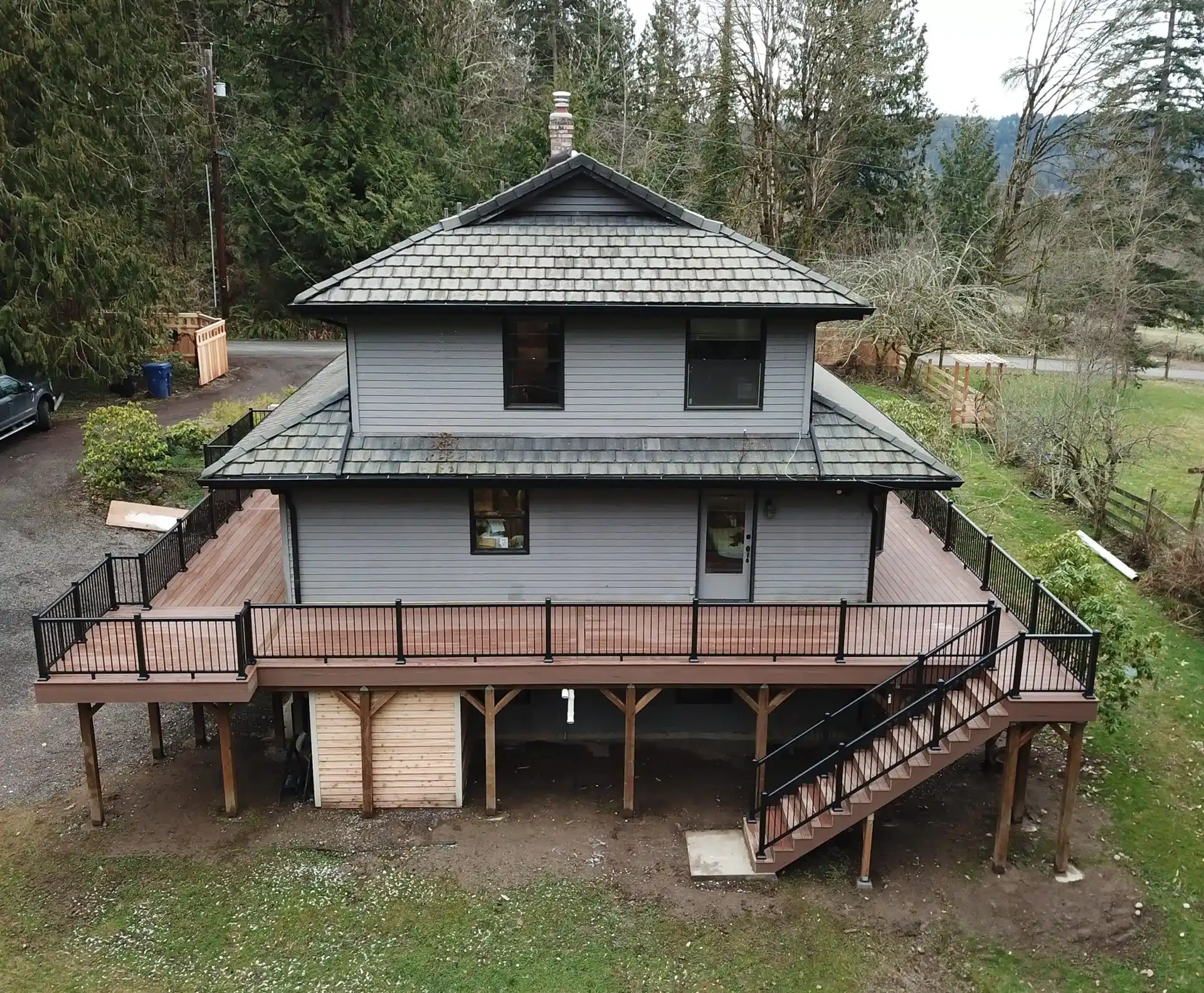 photo of an elevated wraparound deck - Custom deck contractors in Greater Seattle Area