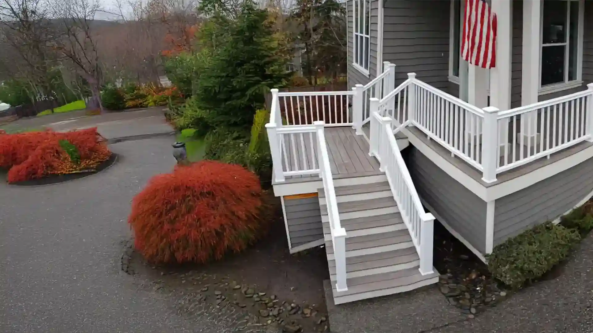 covered porch/deck with white deck railing - Deck Railings Contractor near me