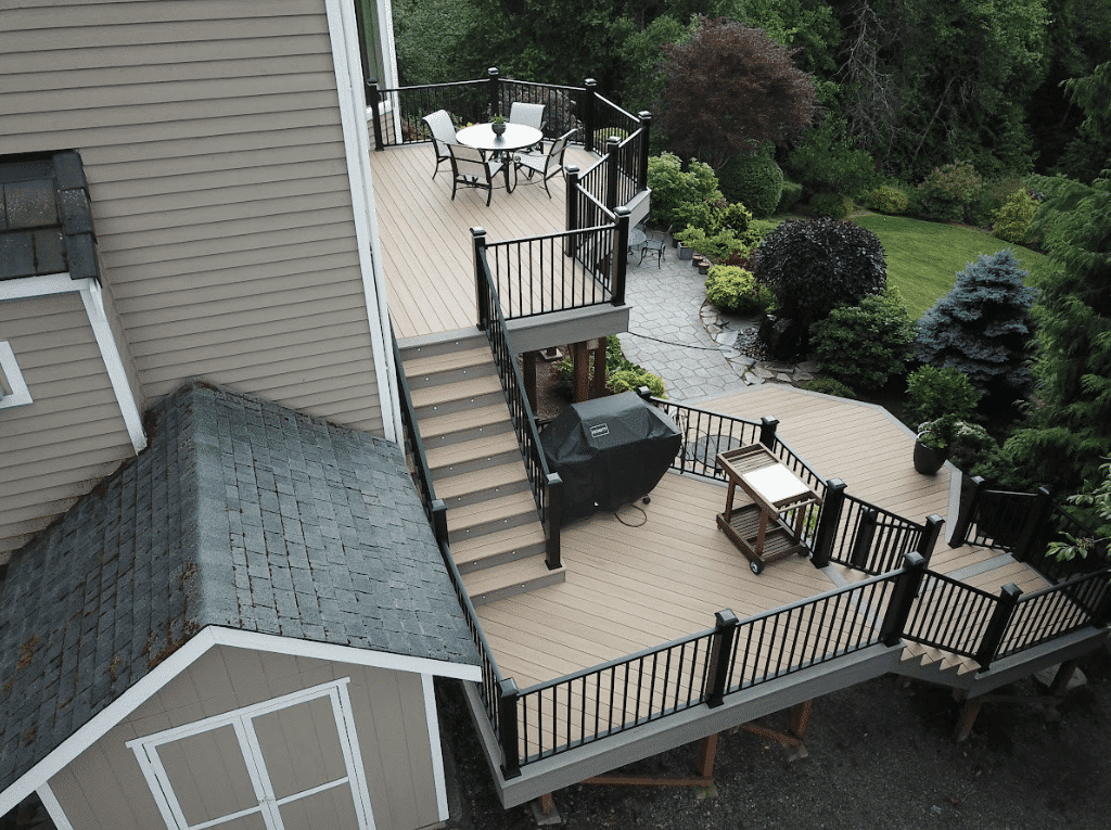 Photo of a multi-level deck with TimberTechAZEK decking - TimberTech Advanced PVC Decking builders near me