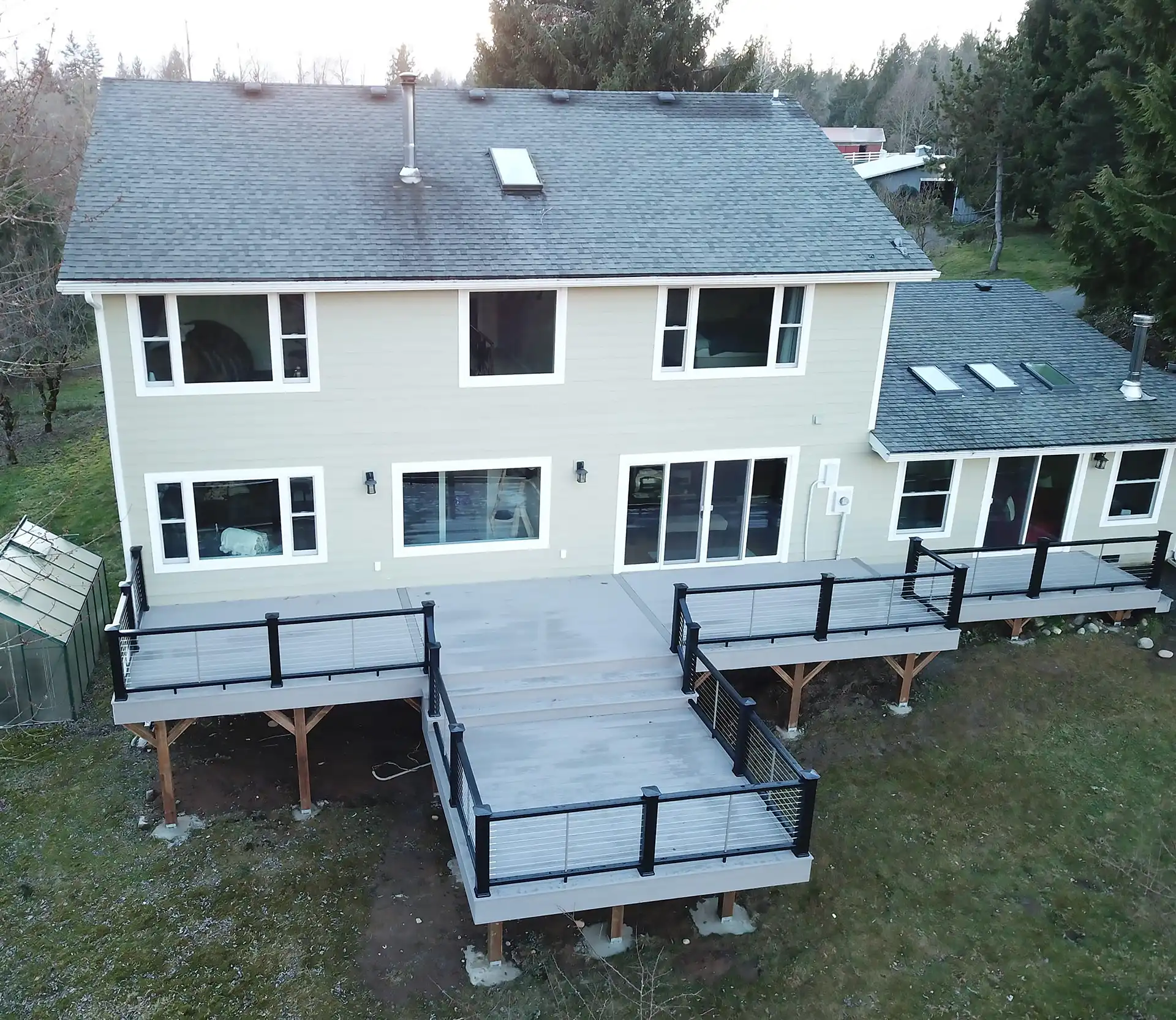 photo of a composite deck with trending color: A soft gray palette